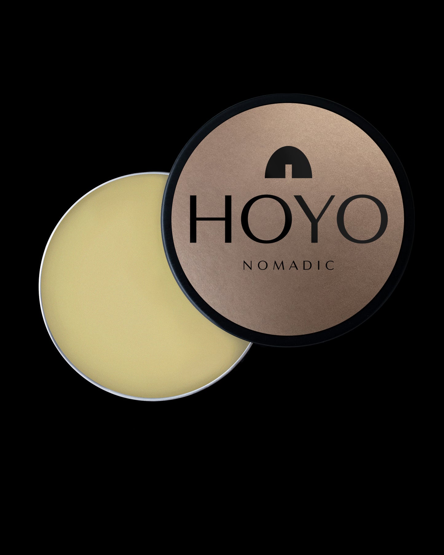 HOYONOMADIC NOMAD LIP BALM -  COCONUT shows our sustainable tin with balm and ingredient inspired label 
